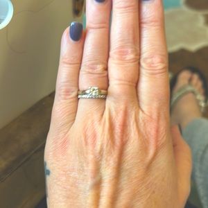 LEO diamond. Comes with band. I have papers somewhere I can find if sold. Size 5